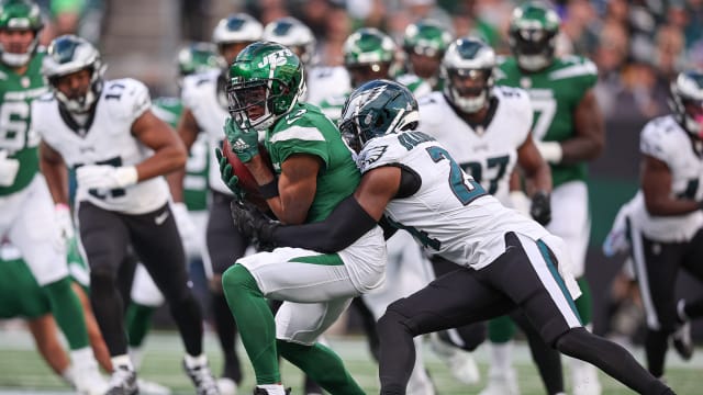 Jets' WR Garrett Wilson gets tackled after making a catch against the Eagles
