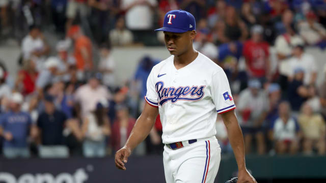 Oct 20, 2023; Arlington, Texas, USA; Texas Rangers pitcher Jose Leclerc (25) reacts after giving up a three-run home run to Houston Astros second baseman Jose Altuve (not pictured) during the ninth inning of game five in the ALCS for the 2023 MLB playoffs at Globe Life Field. Mandatory Credit: Kevin Jairaj-USA TODAY Sports