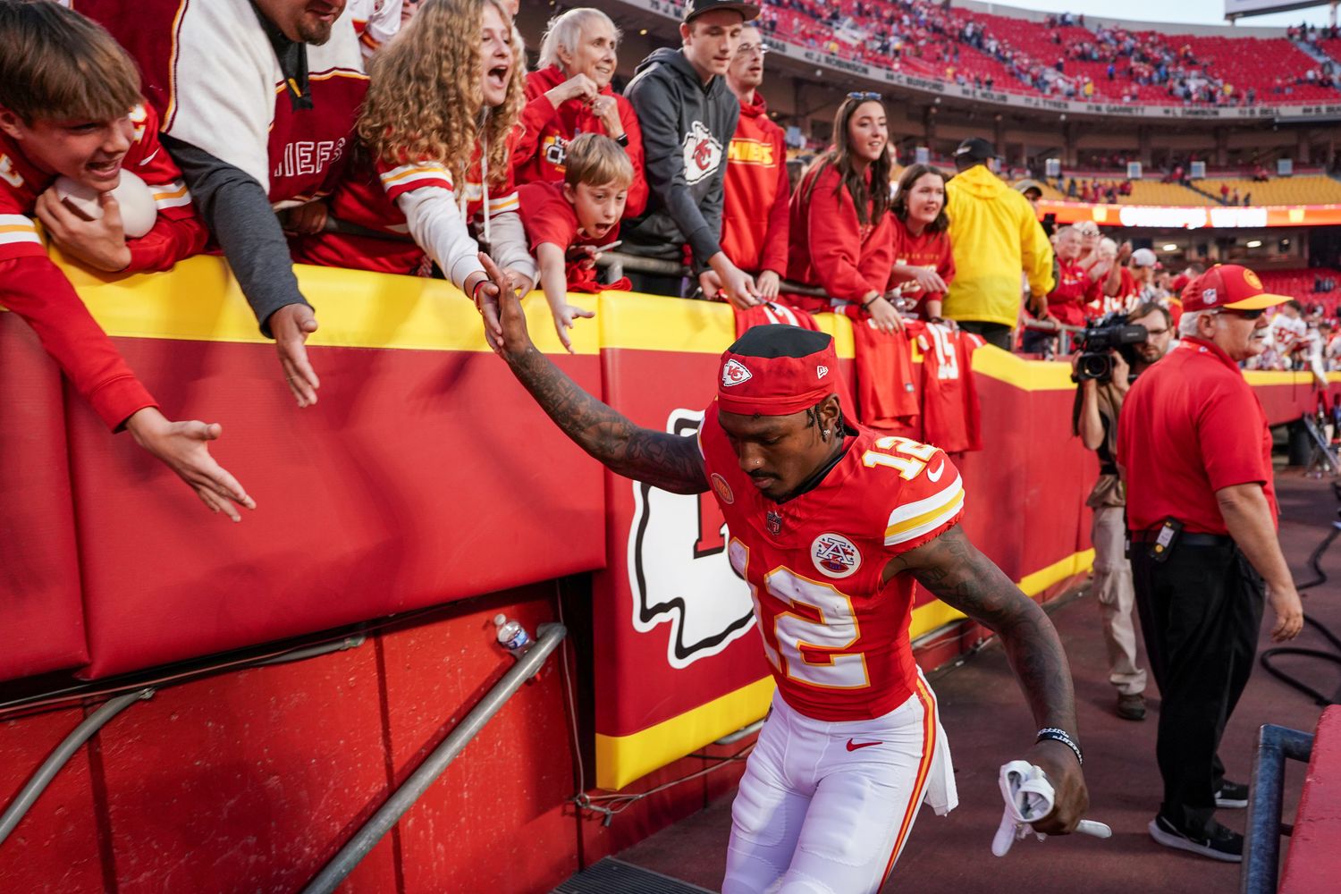 Oct 22, 2023; Kansas City, Missouri, USA; Kansas City Chiefs wide receiver Mecole Hardman Jr. (12) leaves the field after the win over the Los Angeles Chargers at GEHA Field at Arrowhead Stadium. Mandatory Credit: Denny Medley-USA TODAY Sports  