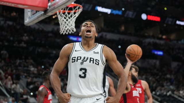 Oct 16, 2023; San Antonio, Texas, USA; San Antonio Spurs forward Keldon Johnson (3) celebrates a shot in the second half against the Houston Rockets at the Frost Bank Center.