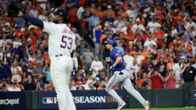 Oct 23, 2023; Houston, Texas, USA; Texas Rangers shortstop Corey Seager (5) rounds the bases after hitting a home run during the first inning of game seven in the ALCS against the Houston Astros for the 2023 MLB playoffs at Minute Maid Park. Mandatory Credit: Erik Williams-USA TODAY Sports