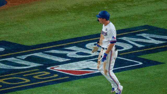 Oct 27, 2023; Arlington, Texas, USA; Texas Rangers shortstop Corey Seager (5) celebrates after he hits a two run home run to tie the game with the Arizona Diamondbacks during the ninth inning in game one of the 2023 World Series at Globe Life Field. Mandatory Credit: Jerome Miron-USA TODAY Sports