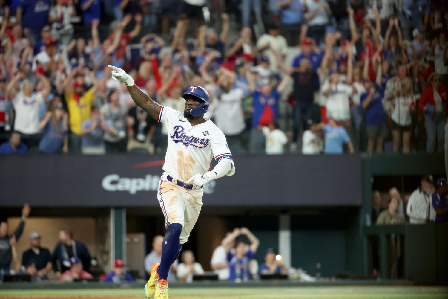 Texas Rangers right fielder Adolis Garcia (53) hits a game-winning solo home run during the eleventh inning in game one of the 2023 World Series against the Arizona Diamondbacks at Globe Life Field.