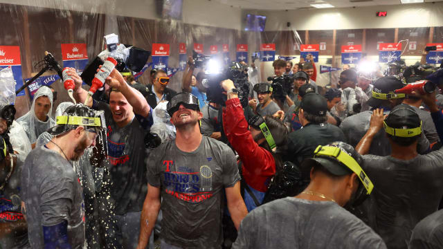 Nov 1, 2023; Phoenix, Arizona, USA; The Texas Rangers celebrate in the locker room after winning the 2023 World Series in five games against the Arizona Diamondbacks at Chase Field. Mandatory Credit: Mark J. Rebilas-USA TODAY Sports