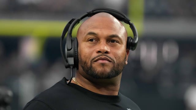 Aug 26, 2022; Paradise, Nevada, USA; Las Vegas Raiders linebackers coach Antonio Pierce watches from the sidelines against the New England Patriots at Allegiant Stadium. The Raiders defeated the Patriots 23-6.