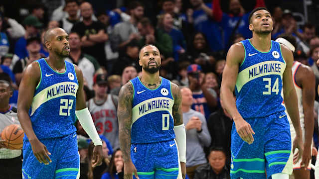 Milwaukee Bucks center Khris Middleton (22), guard Damian Lillard (0) and forward Giannis Antetokounmpo (34) 