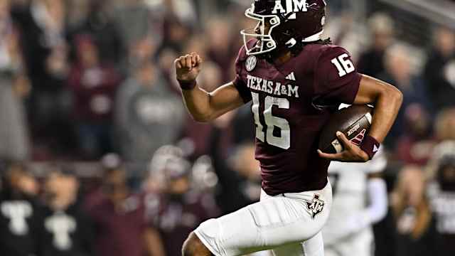 Nov 11, 2023; College Station, Texas, USA; Texas A&M Aggies quarterback Jaylen Henderson (16) runs the ball into the end zone for a touchdown during the first quarter against the Mississippi State Bulldogs at Kyle Field.