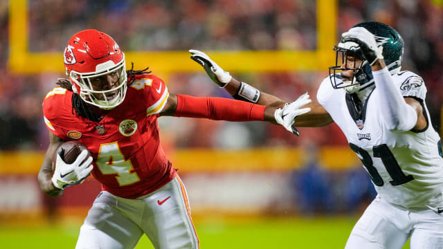 Nov 20, 2023; Kansas City, Missouri, USA; Kansas City Chiefs wide receiver Rashee Rice (4) runs with the ball against Philadelphia Eagles safety Kevin Byard (31) during the first half at GEHA Field at Arrowhead Stadium. Mandatory Credit: Jay Biggerstaff-USA TODAY Sports  