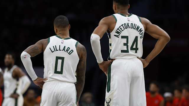 Milwaukee Bucks guard Damian Lillard (0) and Bucks forward Giannis Antetokounmpo (34)