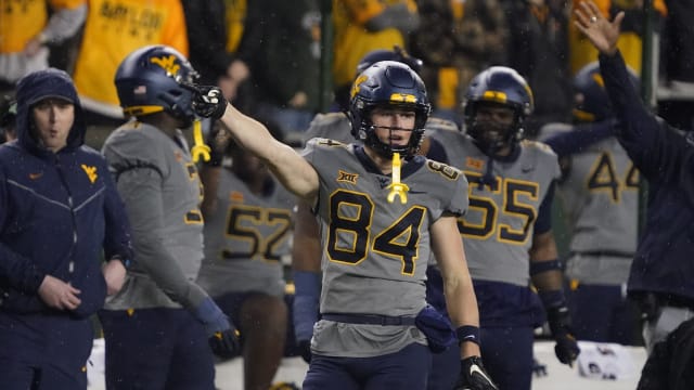 Nov 25, 2023; Waco, Texas, USA; West Virginia Mountaineers wide receiver Hudson Clement (84) reacts after a first down catch against the Baylor Bears during the first half at McLane Stadium.