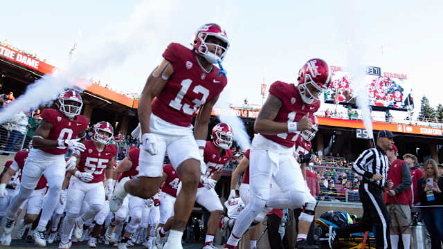 Nov 25, 2023; Stanford, California, USA; Stanford Cardinal players take the field to play the Notre Dame Fighting Irish at Stanford Stadium. Mandatory Credit: D. Ross Cameron-USA TODAY Sports
