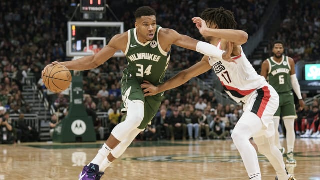 Milwaukee Bucks forward Giannis Antetokounmpo (34) drives for the basket against Portland Trail Blazers guard Shaedon Sharpe (17) 