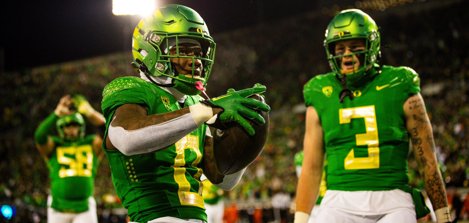 Oregon Ducks running back Bucky Irving celebrates a touchdown against the Oregon State Beavers.