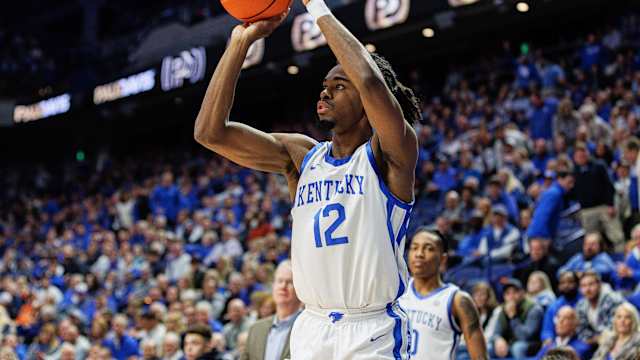 Nov 28, 2023; Lexington, Kentucky, USA; Kentucky Wildcats guard Antonio Reeves (12) shoots the ball during the second half against the Miami (Fl) Hurricanes at Rupp Arena at Central Bank Center. Mandatory Credit: Jordan Prather-USA TODAY Sports