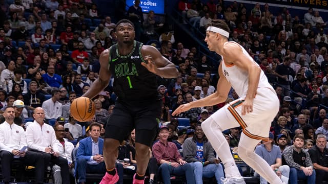 Dec 1, 2023; New Orleans, Louisiana, USA; New Orleans Pelicans forward Zion Williamson (1) drives to the basket against San Antonio Spurs forward Zach Collins (23) during the first half at the Smoothie King Center.