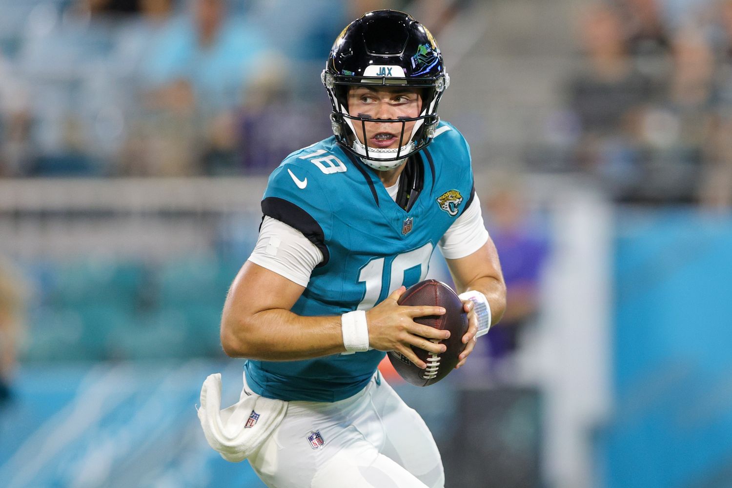 Aug 26, 2023; Jacksonville, Florida, USA; Jacksonville Jaguars quarterback Nathan Rourke (18) drops back to pass against the Miami Dolphins in the third quarter at EverBank Stadium. Mandatory Credit: Nathan Ray Seebeck-USA TODAY Sports