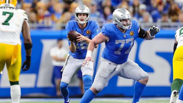 Detroit Lions center Frank Ragnow looks to block for quarterback Jared Goff.