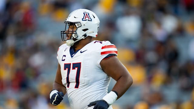 Nov 25, 2023; Tempe, Arizona, USA; Arizona Wildcats offensive lineman Jordan Morgan (77) against the Arizona State Sun Devils during the Territorial Cup at Mountain America Stadium. Mandatory Credit: Mark J. Rebilas-USA TODAY Sports  