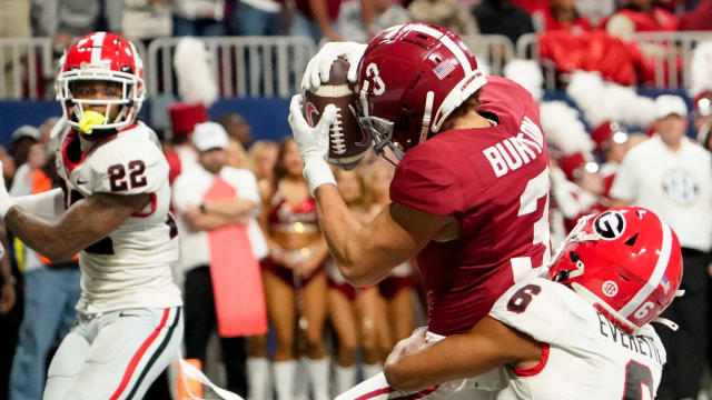 Dec 2, 2023; Atlanta, GA, USA; Alabama Crimson Tide wide receiver Jermaine Burton (3) catches a touchdown pass against Georgia Bulldogs defensive back Daylen Everette (6) at Mercedes-Benz Stadium. Mandatory Credit: Gary Cosby Jr.-USA TODAY Sports