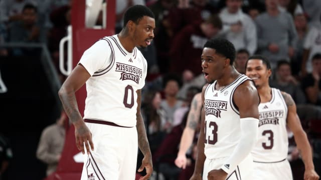 Nov 14, 2023; Starkville, Mississippi, USA; Mississippi State Bulldogs forward D.J. Jeffries (0) reacts with guard Josh Hubbard (13) after a dunk during the second half against the North Alabama Lions at Humphrey Coliseum. Mandatory Credit: Petre Thomas-USA TODAY Sports