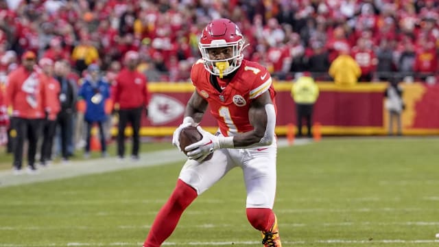 Dec 10, 2023; Kansas City, Missouri, USA; Kansas City Chiefs running back Jerick McKinnon (1) runs the ball against the Buffalo Bills during the first half at GEHA Field at Arrowhead Stadium. Mandatory Credit: Denny Medley-USA TODAY Sports  
