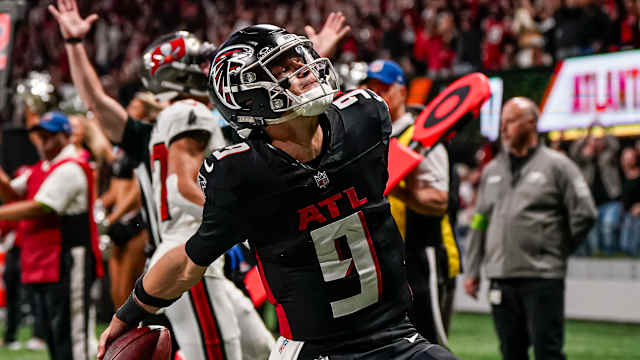 Atlanta Falcons quarterback Desmond Ridder (9) reacts after scoring a touchdown against the Tampa Bay Buccaneers during the second half at Mercedes-Benz Stadium.