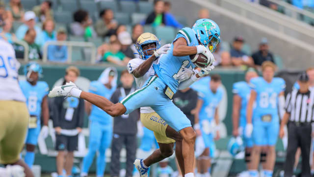 Nov 11, 2023; New Orleans, Louisiana, USA; Tulsa Golden Hurricane cornerback NuNu Campbell (13) defends Tulane Green Wave wide receiver Chris Brazzell II (17) after a catch in fourth quarter action at Yulman Stadium. Mandatory Credit: Matthew Dobbins-USA TODAY Sports