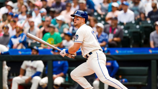 Jul 16, 2023; Seattle, Washington, USA; Seattle Mariners left fielder Jarred Kelenic (10) hits an RBI-double against the Detroit Tigers during the first inning at T-Mobile Park.