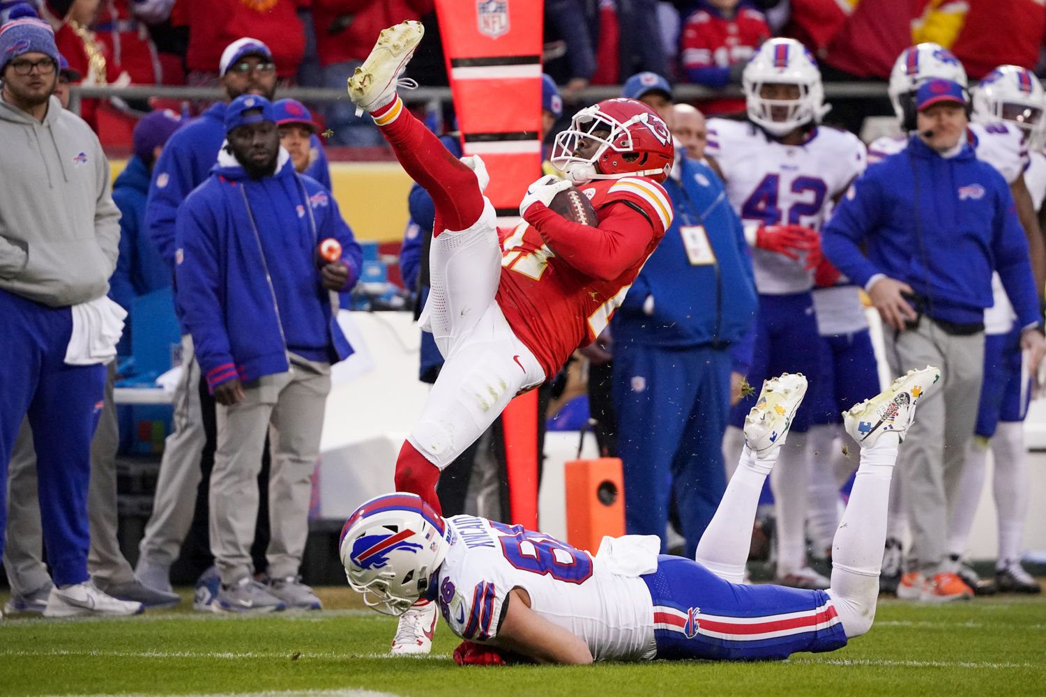 Dec 10, 2023; Kansas City, Missouri, USA; Kansas City Chiefs safety Chamarri Conner (27) intercepts a pass intended for Buffalo Bills tight end Dalton Kincaid (86) during the first half at GEHA Field at Arrowhead Stadium. Mandatory Credit: Denny Medley-USA TODAY Sports  