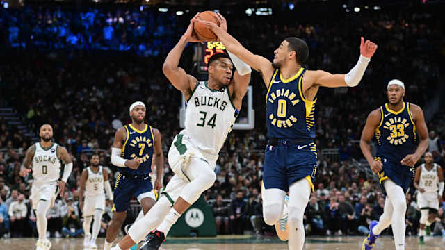 Milwaukee Bucks forward Giannis Antetokounmpo (34) drives for the basket against Indiana Pacers guard Tyrese Haliburton (0) i