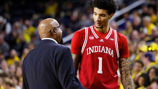 Dec 5, 2023; Ann Arbor, Michigan, USA; Indiana Hoosiers head coach Mike Woodson talks to Indiana Hoosiers center Kel'el Ware (1) in the first half against the Michigan Wolverines at Crisler Center. Mandatory Credit: Rick Osentoski-USA TODAY Sports  