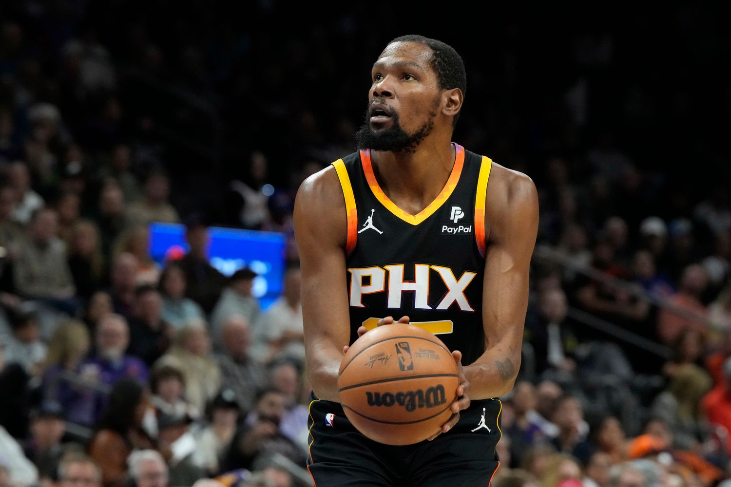 Dec 15, 2023; Phoenix, Arizona, USA; Phoenix Suns forward Kevin Durant (35) shoots a technical foul against the New York Knicks in the first half at Footprint Center. Mandatory Credit: Rick Scuteri-USA TODAY Sports