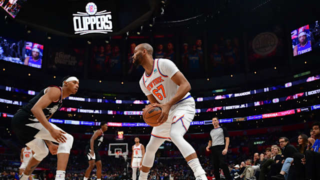 New York Knicks center Taj Gibson (67) controls the ball against Los Angeles Clippers guard Brandon Boston Jr. (4) during the second half at Crypto.com Arena.