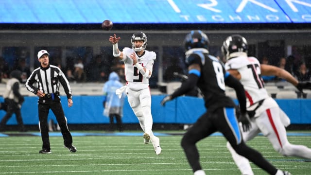 Atlanta Falcons quarterback Desmond Ridder (9) passes the ball to receiver KhaDarel Hodge (12) in the first quarter at Bank of America Stadium.