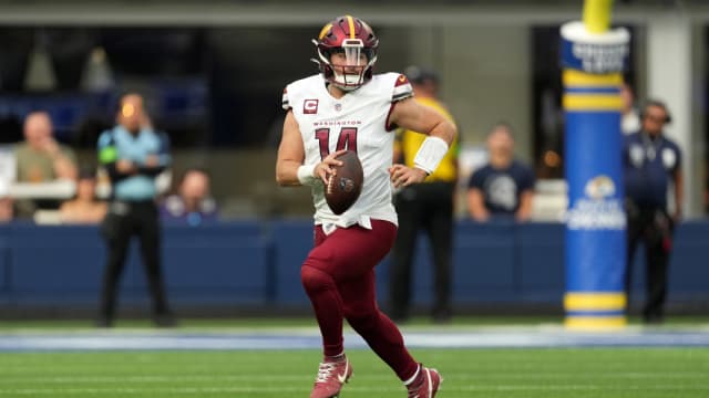 Dec 17, 2023; Inglewood, California, USA; Washington Commanders quarterback Sam Howell (14) throws the ball against the Los Angeles Rams in the first half at SoFi Stadium.
