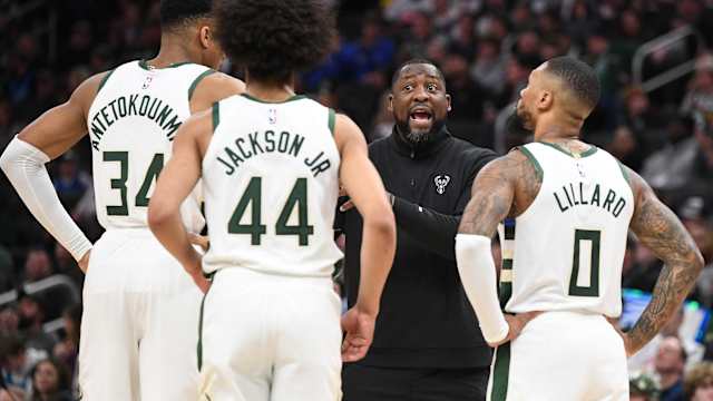 Milwaukee Bucks head coach Adrian Griffin talks to Giannis, Damian Lillard,and Andre Jackson Jr.