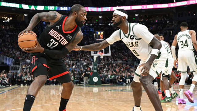 Dec 17, 2023; Milwaukee, Wisconsin, USA; Houston Rockets forward Jeff Green (32) drives against Milwaukee Bucks forward Bobby Portis (9) in the second half at Fiserv Forum.