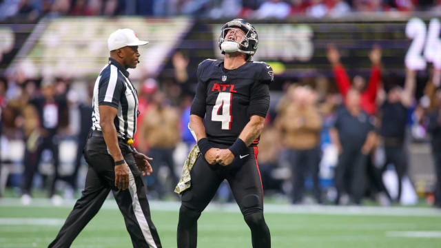 Nov 5, 2023; Atlanta, Georgia, USA; Atlanta Falcons quarterback Taylor Heinicke (4) reacts after a touchdown against the Minnesota Vikings in the second half at Mercedes-Benz Stadium.