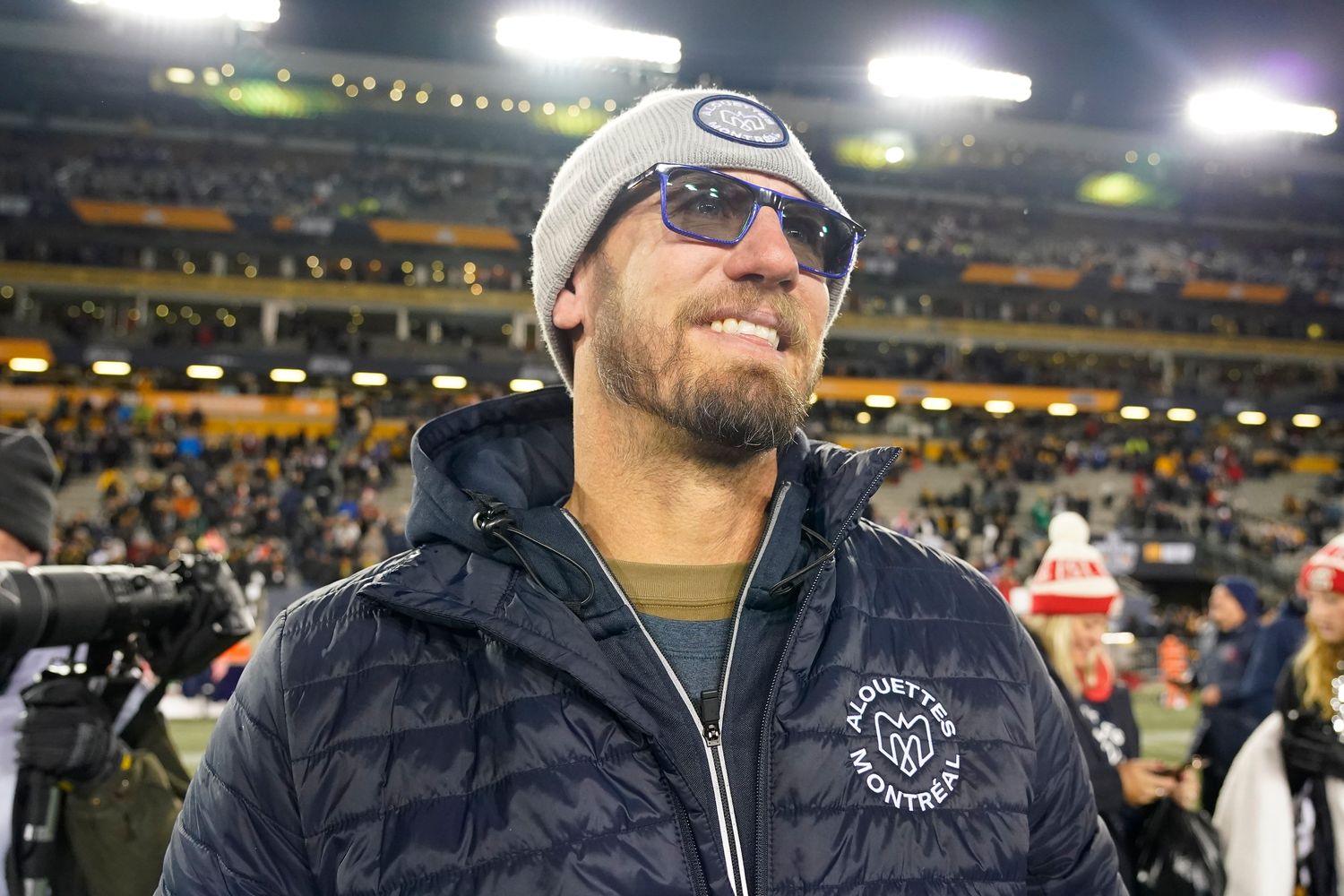 Nov 19, 2023; Hamilton, Ontario, CAN; Montreal Alouettes head coach Jason Maas watches his team celebrate after winning the 110th Grey Cup against the Winnipeg Blue Bombers at Tim Hortons Field. Mandatory Credit: John E. Sokolowski-USA TODAY Sports  