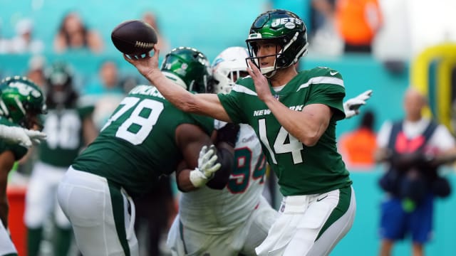 QB Trevor Siemian attempts a pass against Miami