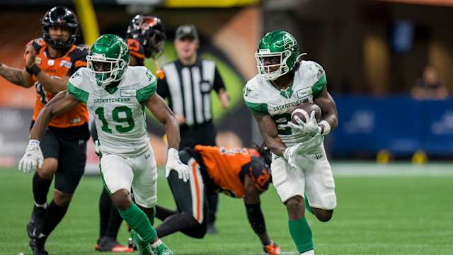 Aug 26, 2022; Vancouver, British Columbia, CAN; Saskatchewan Roughriders wide receiver Samuel Emilus (19) and running back Frankie Hickson (20) run upfield against the BC Lions in the second half at BC Place. Mandatory Credit: Bob Frid-USA TODAY Sports