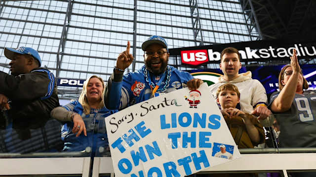 Detroit Lions fans cheer at U.S. Bank Stadium on Christmas Eve.