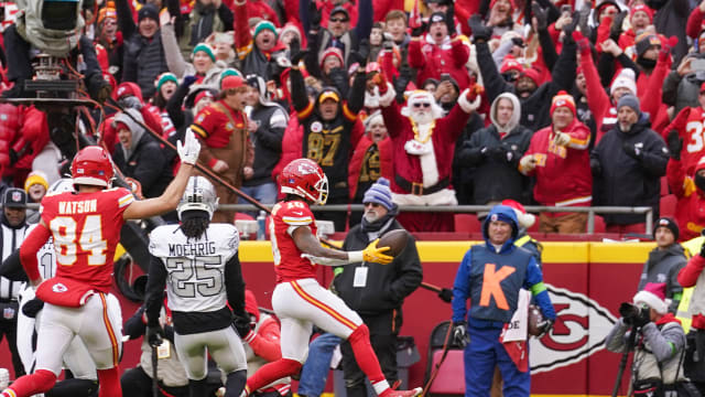 Dec 25, 2023; Kansas City, Missouri, USA; Kansas City Chiefs running back Isiah Pacheco (10) scores a touchdown against the Las Vegas Raiders during the first half at GEHA Field at Arrowhead Stadium. Mandatory Credit: Denny Medley-USA TODAY Sports  