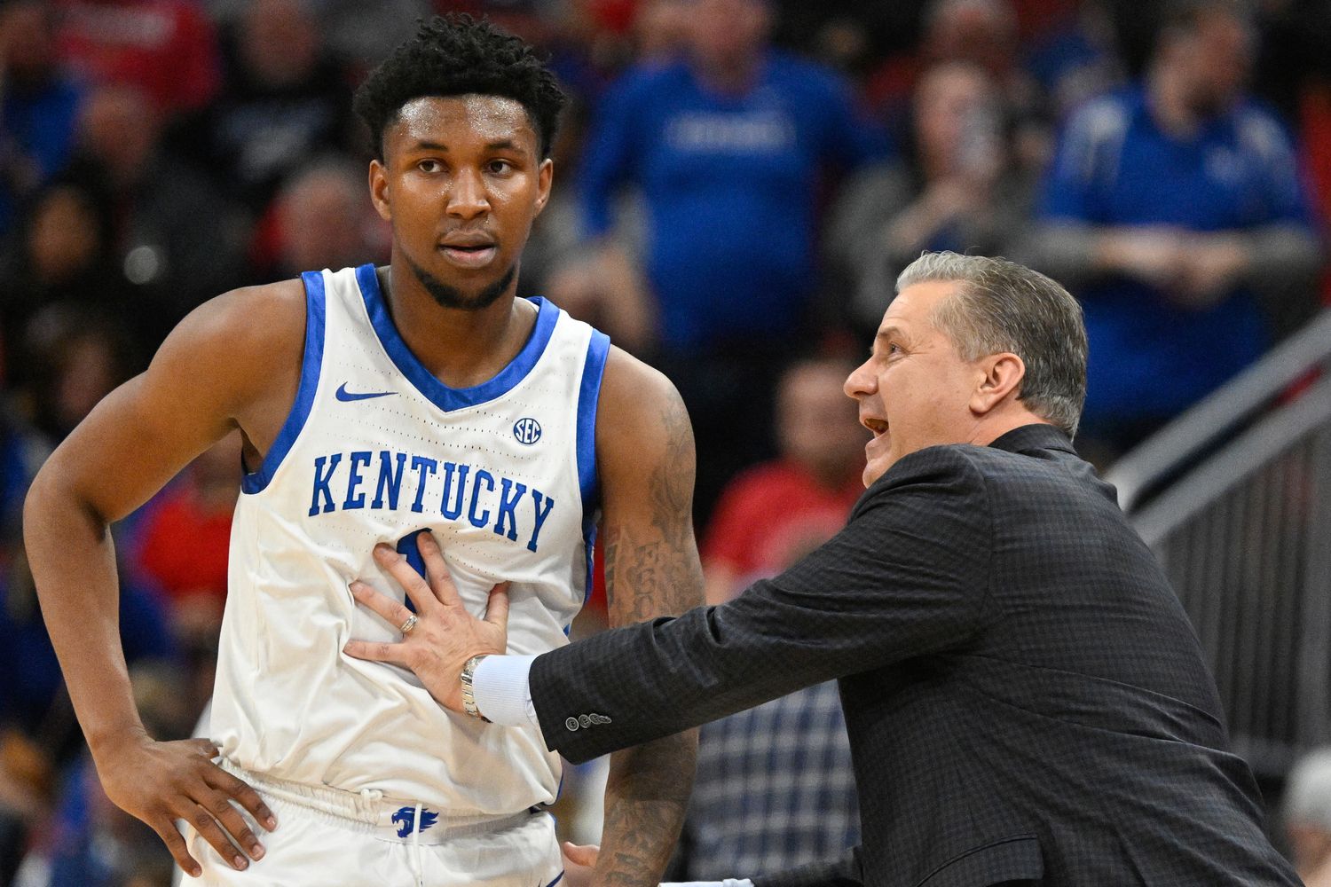 Dec 21, 2023; Louisville, Kentucky, USA; Kentucky Wildcats head coach John Calipari talks with guard Justin Edwards (1) during the first half against the Louisville Cardinals at KFC Yum! Center. Kentucky defeated Louisville 95-76. Mandatory Credit: Jamie Rhodes-USA TODAY Sports