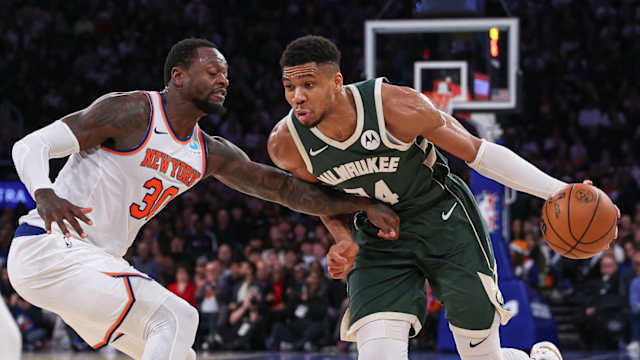 Milwaukee Bucks forward Giannis Antetokounmpo (34) dribbles against New York Knicks forward Julius Randle (30)