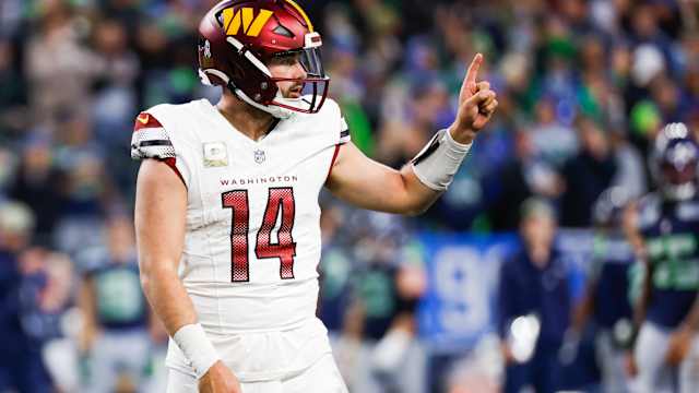 Nov 12, 2023; Seattle, Washington, USA; Washington Commanders quarterback Sam Howell (14) signals to the sideline during the fourth quarter against the Seattle Seahawks at Lumen Field.