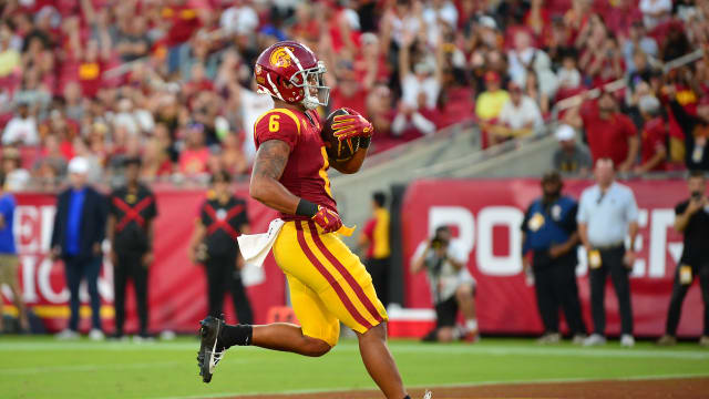 Aug 26, 2023; Los Angeles, California, USA; Southern California Trojans running back Austin Jones (6) runs the ball for a touchdown against the San Jose State Spartans during the second half at Los Angeles Memorial Coliseum. Mandatory Credit: Gary A. Vasquez-USA TODAY Sports