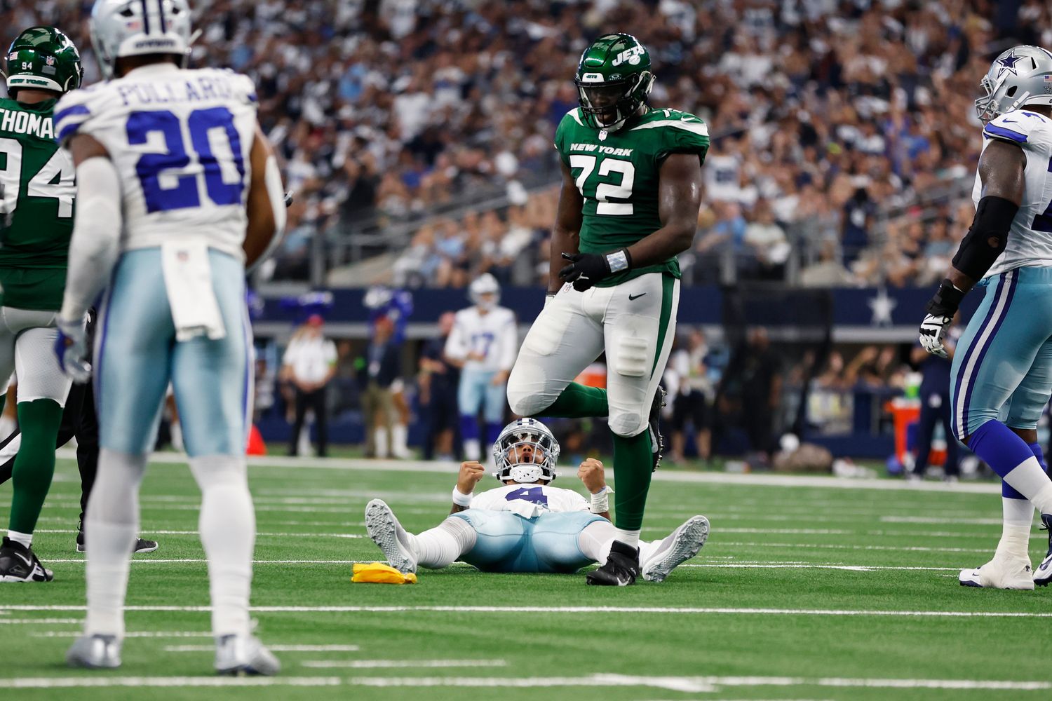 Jets' DL Micheal Clemons after Cowboys' QB Dak Prescott throws a TD pass