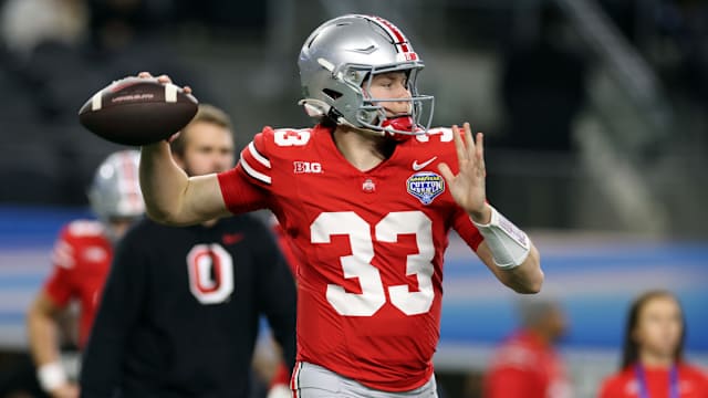 Dec 29, 2023; Arlington, TX, USA; Ohio State Buckeyes quarterback Devin Brown (33) throws a pass before the game against the Missouri Tigers at AT&T Stadium.