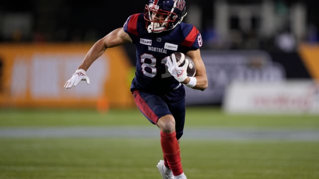 Nov 19, 2023; Hamilton, Ontario, CAN; Montreal Alouettes wide receiver Austin Mack (81) scores a touchdown against the Winnipeg Blue Bombers during the 110th Grey Cup at Tim Hortons Field. Mandatory Credit: John E. Sokolowski-USA TODAY Sports  